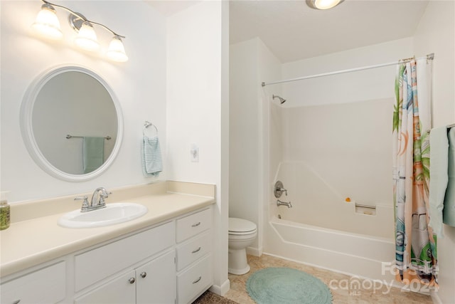 full bathroom featuring tile patterned flooring, shower / bath combo with shower curtain, vanity, and toilet