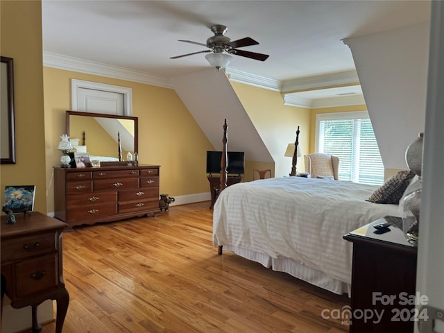 bedroom featuring ceiling fan, ornamental molding, and light wood-type flooring