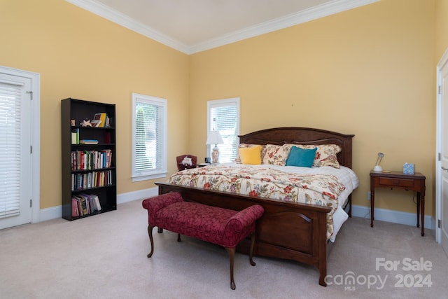 bedroom with light colored carpet and ornamental molding