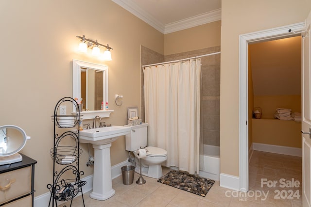 bathroom with tile patterned floors, crown molding, shower / bath combo, and toilet