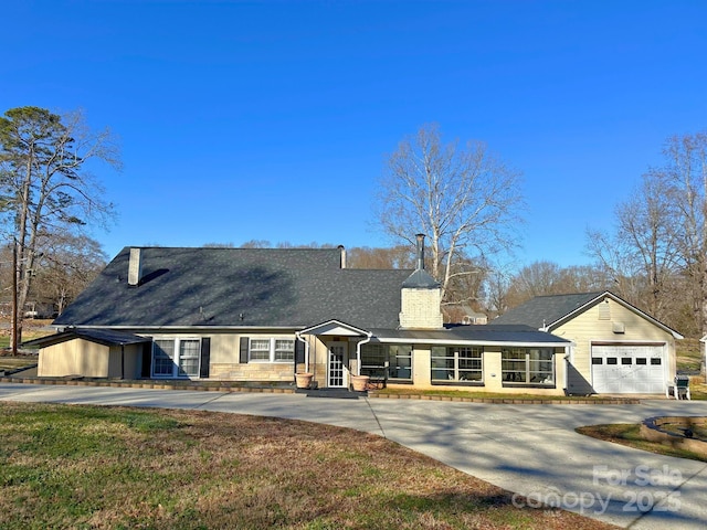 ranch-style home with a garage