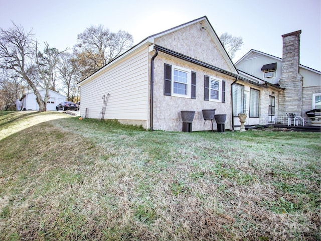 view of property exterior featuring a yard