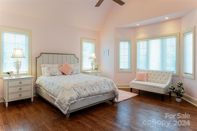 bedroom with dark hardwood / wood-style flooring, ceiling fan, and lofted ceiling