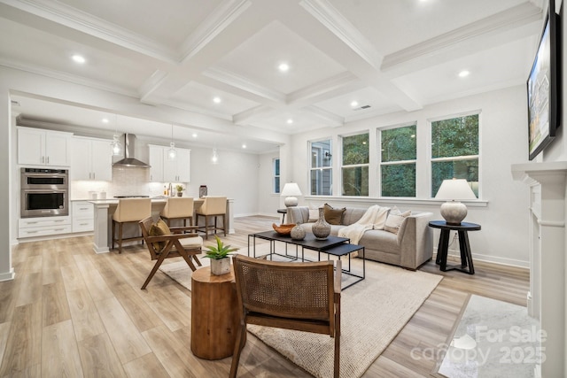 living room with coffered ceiling, light hardwood / wood-style flooring, and beamed ceiling