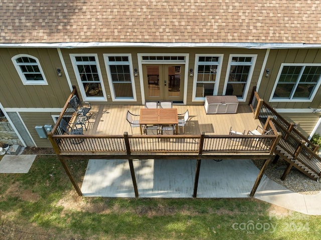 wooden terrace featuring french doors