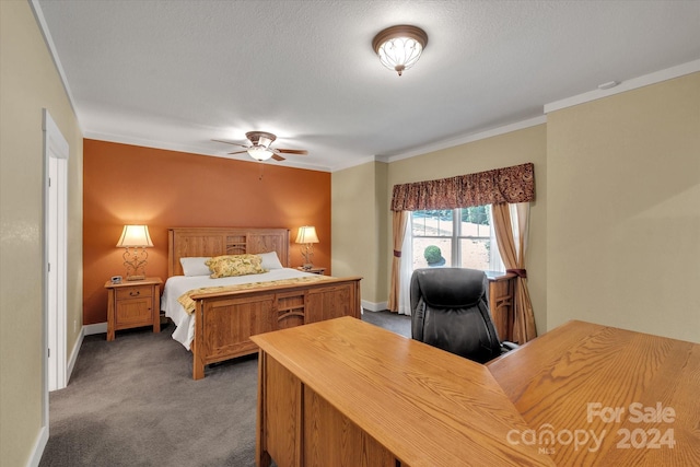 bedroom featuring a textured ceiling, ceiling fan, and dark carpet