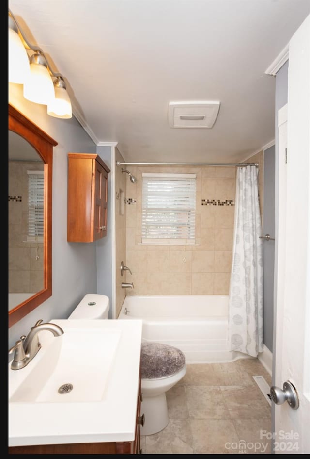 full bathroom with vanity, toilet, and shower / bath combo