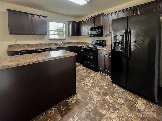 kitchen featuring dark brown cabinets, black appliances, and sink