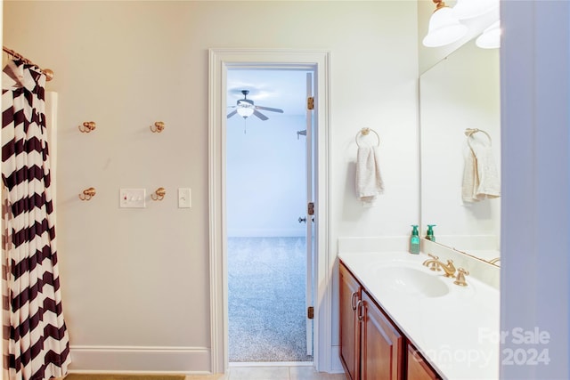 bathroom featuring vanity and ceiling fan