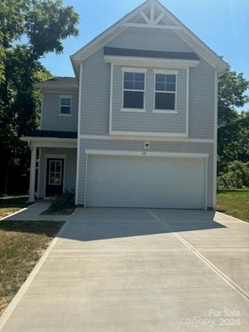 view of front of property with a garage