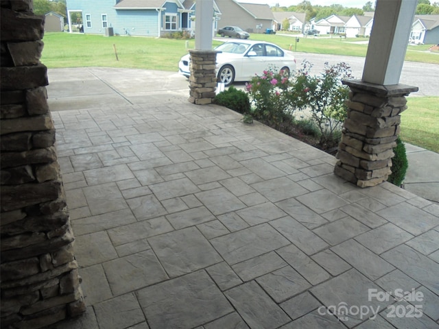 view of patio / terrace with a residential view