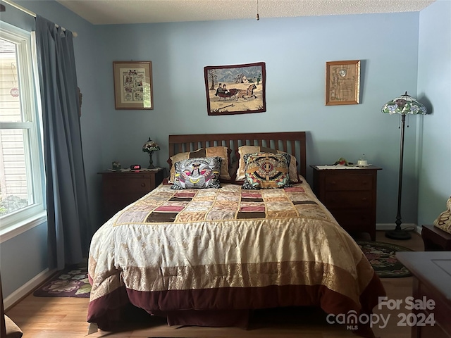 bedroom featuring light hardwood / wood-style flooring