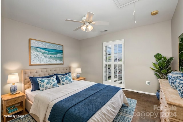 bedroom with dark wood-type flooring and ceiling fan