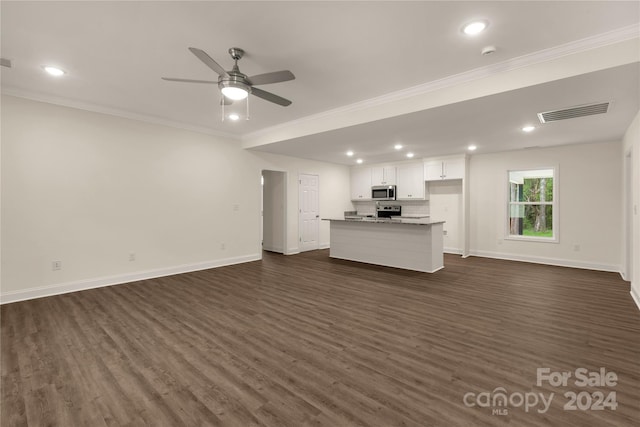 unfurnished living room with ceiling fan, dark hardwood / wood-style flooring, and crown molding