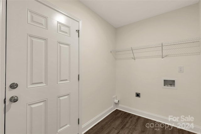 washroom featuring dark hardwood / wood-style floors, hookup for a washing machine, and electric dryer hookup