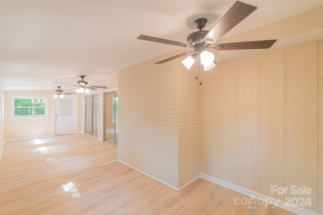 empty room with light hardwood / wood-style floors