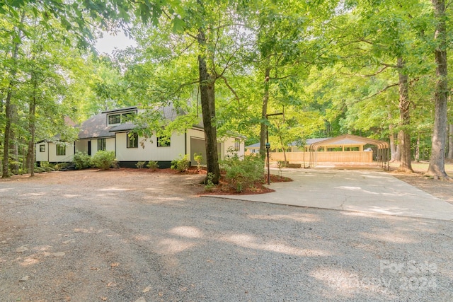 view of front of property with a carport