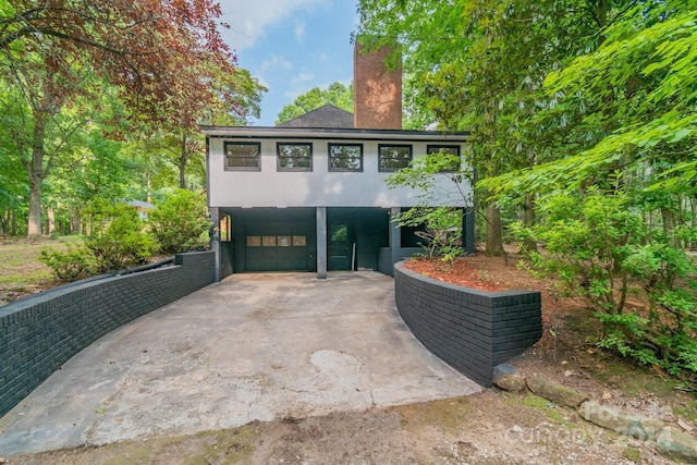 exterior space with a carport