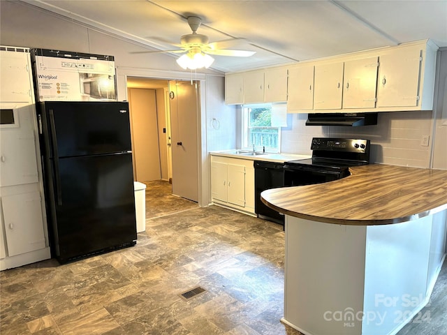 kitchen featuring black appliances, kitchen peninsula, ceiling fan, tasteful backsplash, and white cabinetry