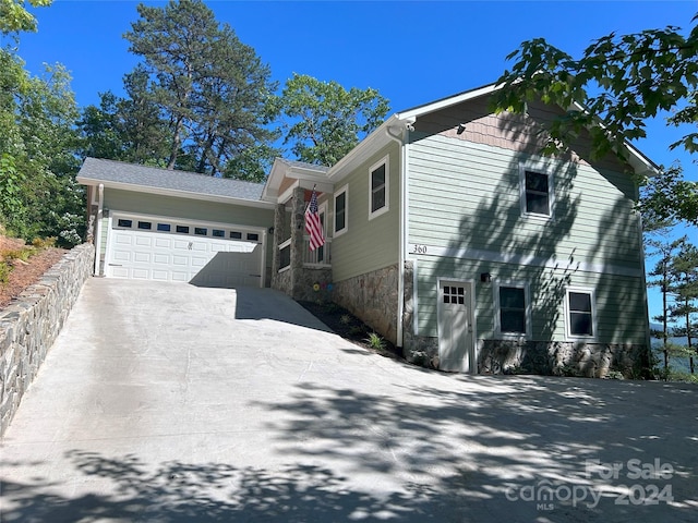 view of front of property featuring a garage