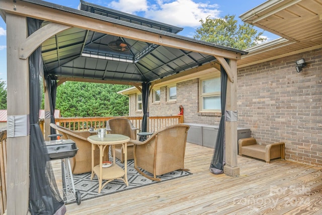 wooden terrace with a gazebo