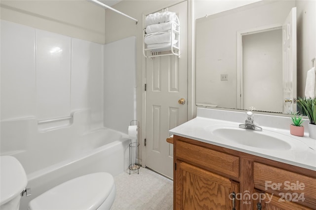 full bathroom with vanity, toilet, and washtub / shower combination