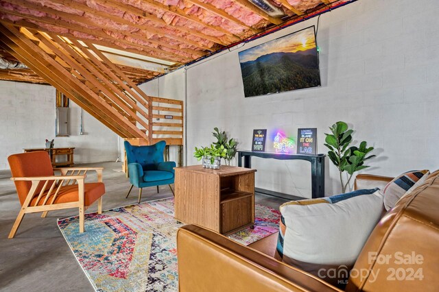 living room featuring concrete floors