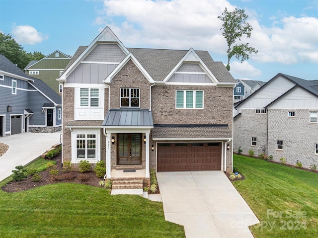 craftsman house featuring a garage, covered porch, and a front lawn