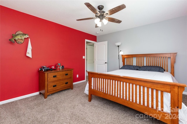 bedroom with ceiling fan and carpet