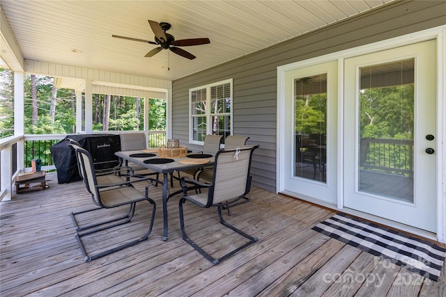 wooden terrace with ceiling fan