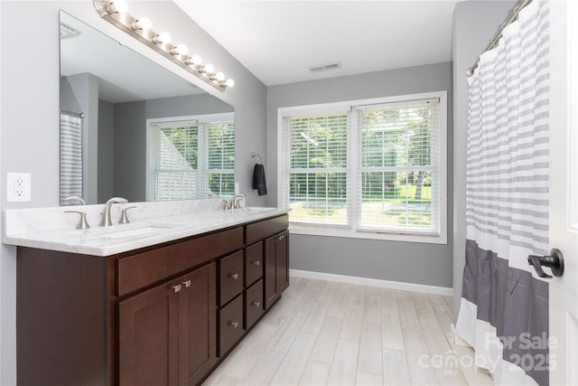 460 Panther Branch Rd, Alexander, NC 28701 - full bath featuring double vanity and baseboards