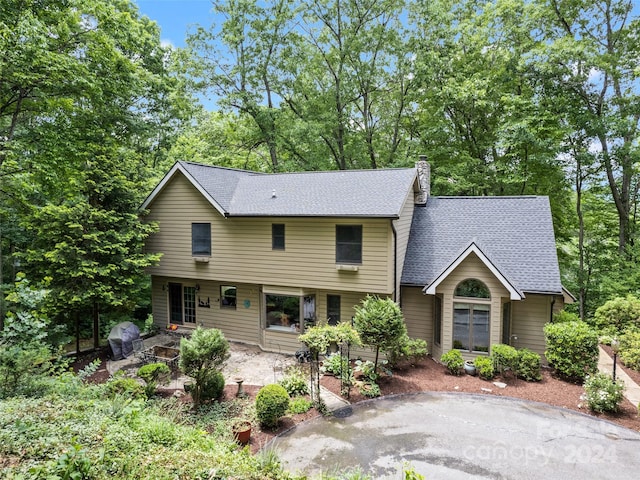 view of front of house with a patio