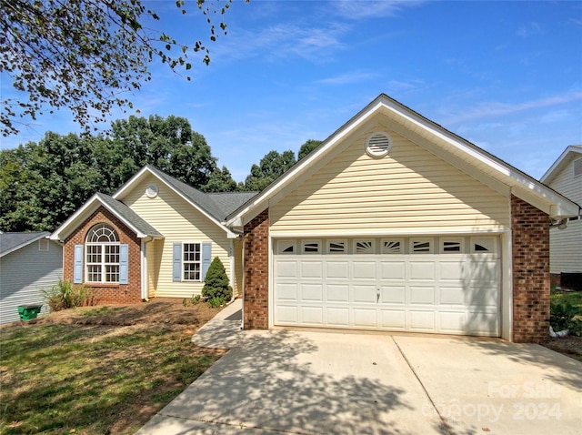 ranch-style home with a garage