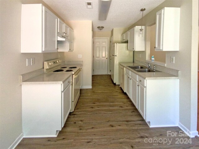 kitchen featuring sink, white appliances, light hardwood / wood-style floors, range hood, and white cabinetry