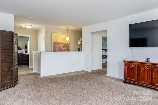 living room featuring light carpet