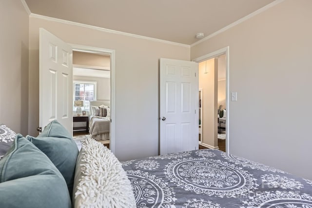 bedroom with ornamental molding