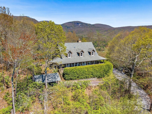 drone / aerial view featuring a mountain view