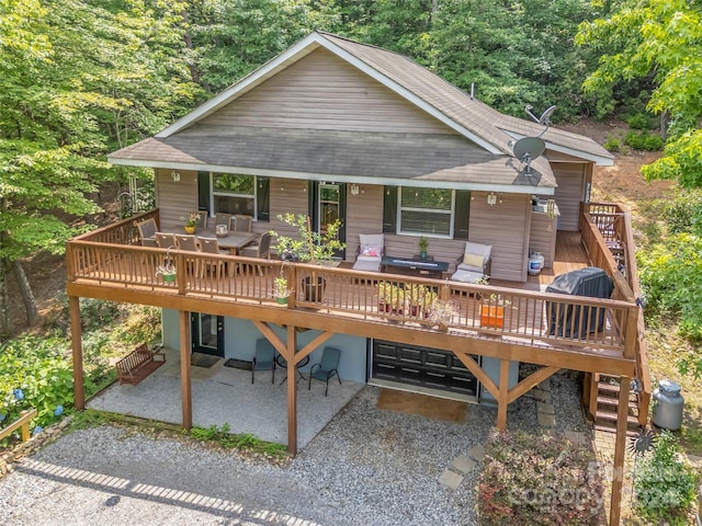 view of front of house featuring a patio area and a deck