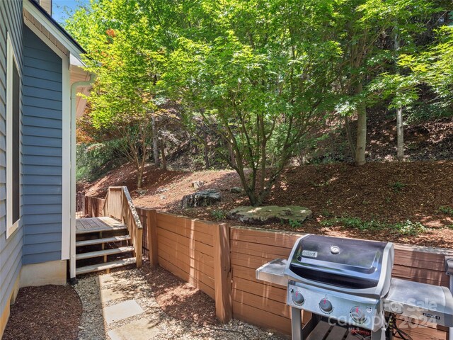 view of yard featuring a wooden deck