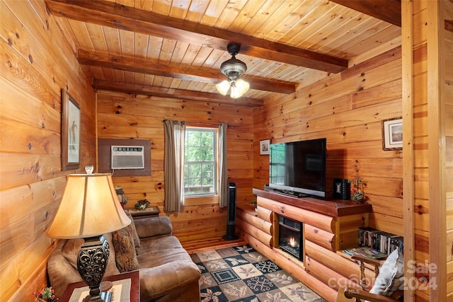 living room featuring beamed ceiling, wooden walls, a wall mounted AC, ceiling fan, and wooden ceiling