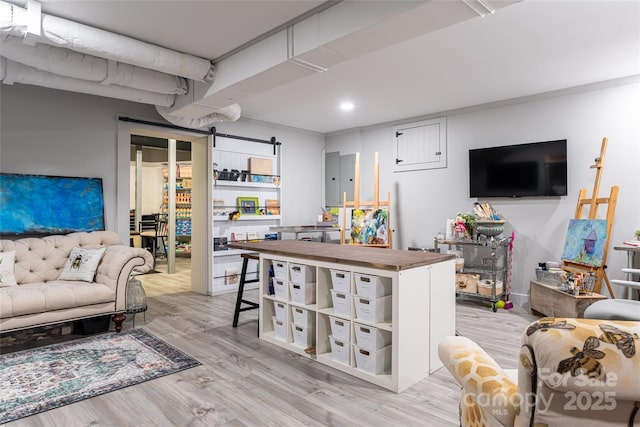 living room with light hardwood / wood-style flooring