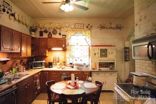 kitchen with sink, ceiling fan, white range, and black dishwasher