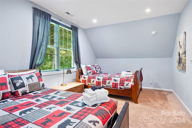 bedroom with recessed lighting, light carpet, visible vents, baseboards, and vaulted ceiling