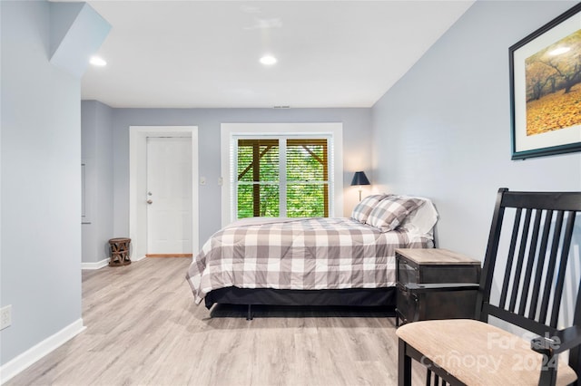 bedroom featuring recessed lighting, light wood-style flooring, and baseboards