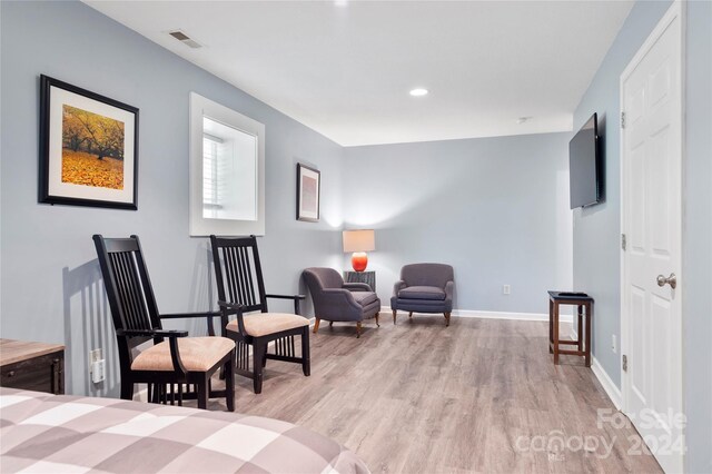 bedroom with light wood-type flooring