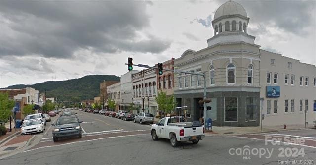 view of building exterior with a mountain view