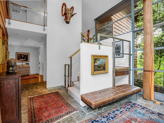 entryway with a towering ceiling