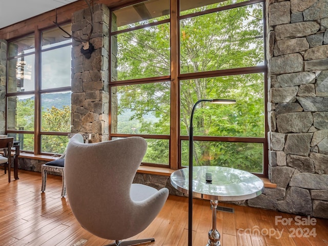 sunroom / solarium featuring plenty of natural light