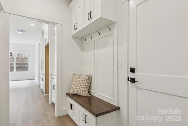 201 Plato Pl, Etowah, NC 28729 - mudroom featuring visible vents, baseboards, and light wood finished floors