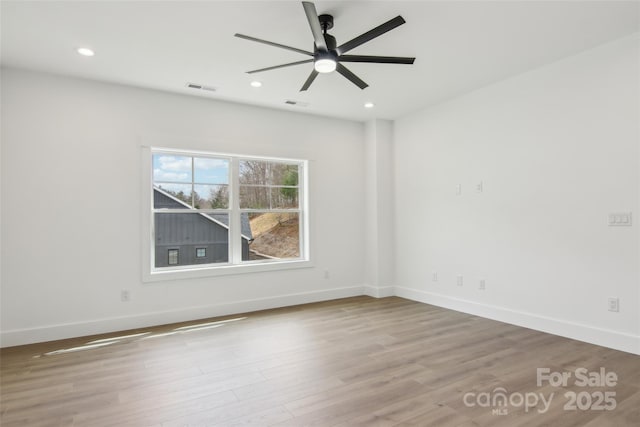 201 Plato Pl, Etowah, NC 28729 - empty room with visible vents, recessed lighting, baseboards, and wood finished floors